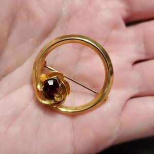 Vintage gold tone circular flower brooch